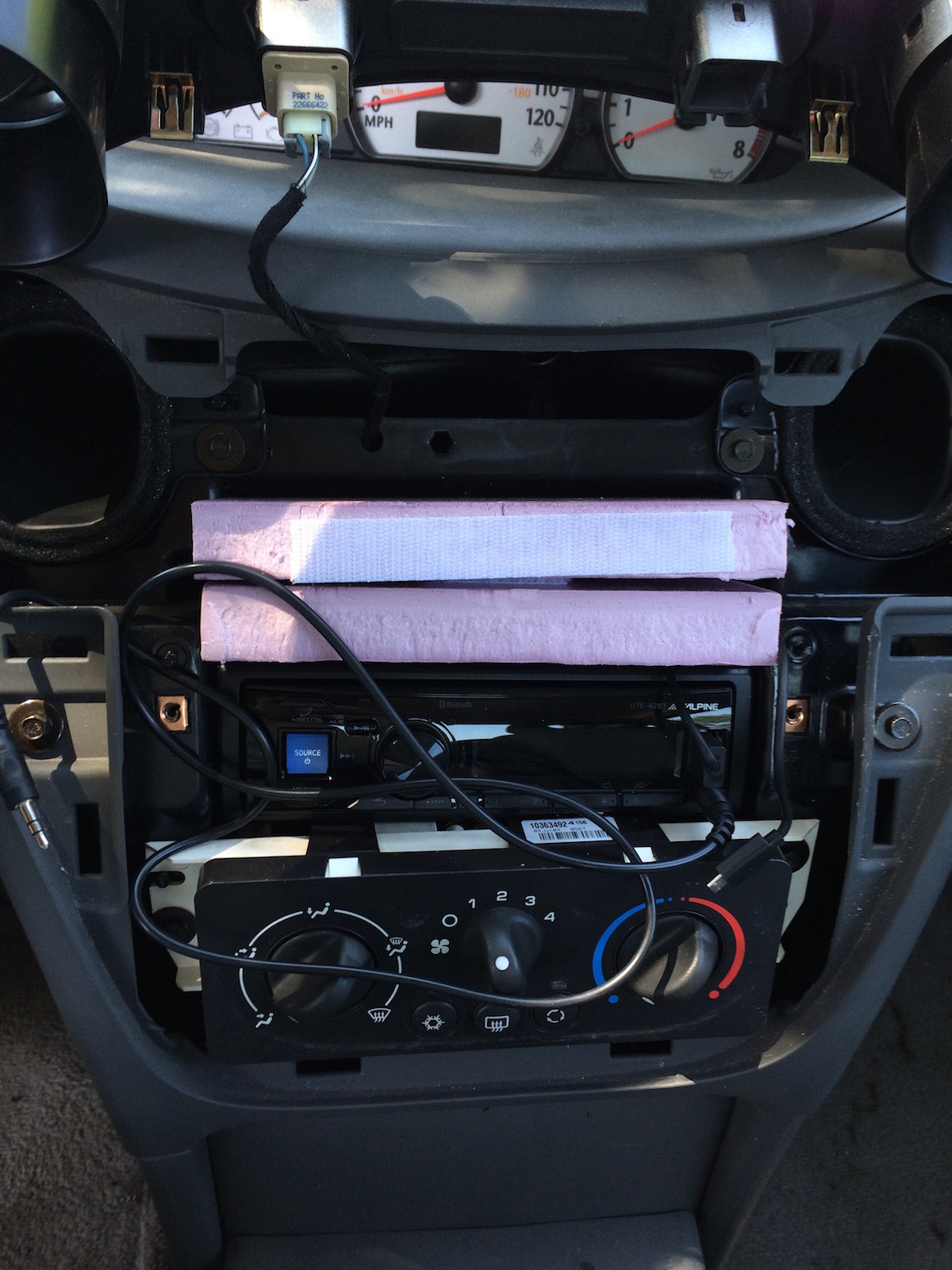 Foam boards, velcro and radio used to mount the Nexus 7 behind the dash